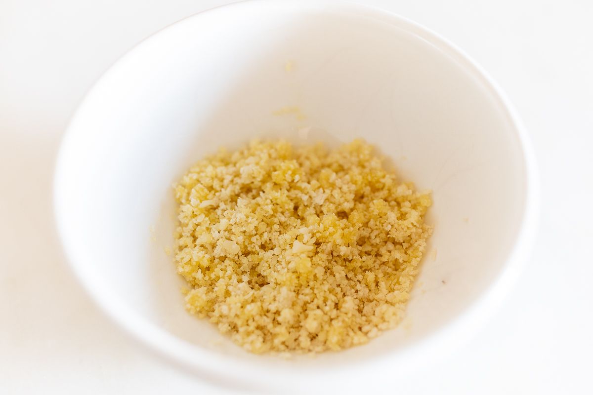 Bread crumbs in a white bowl.
