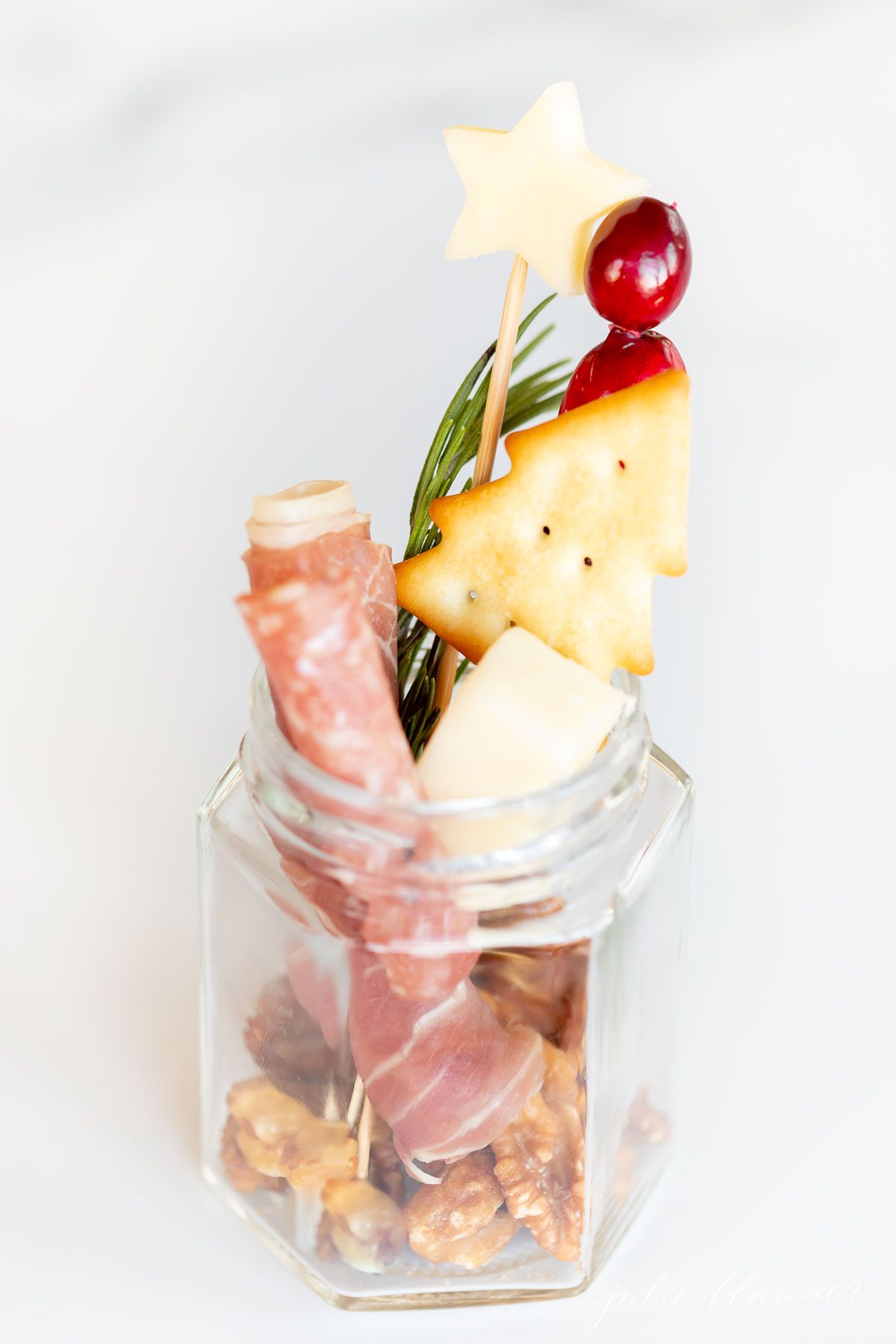 Charcuterie in a jar on a marble countertop