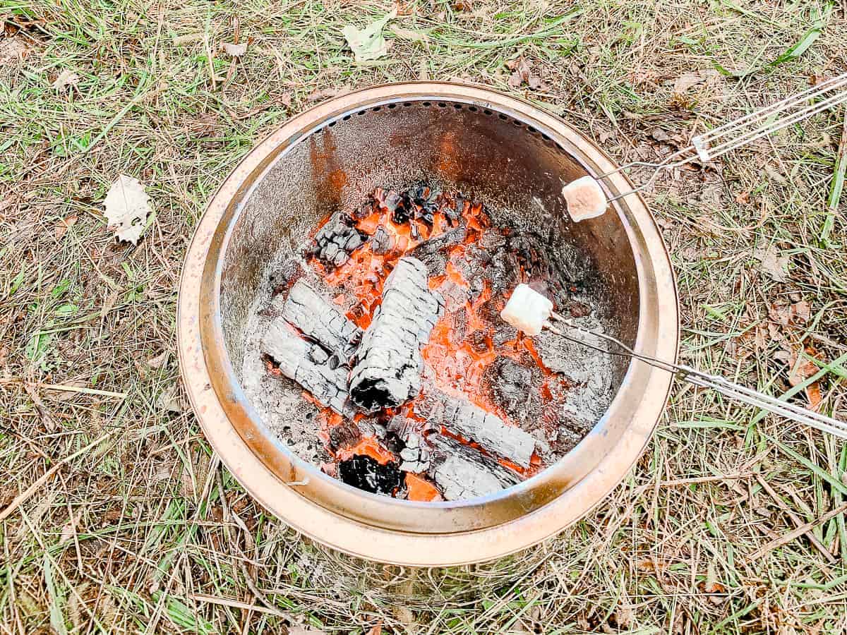 marshmallows roasting over solo stove fire pit