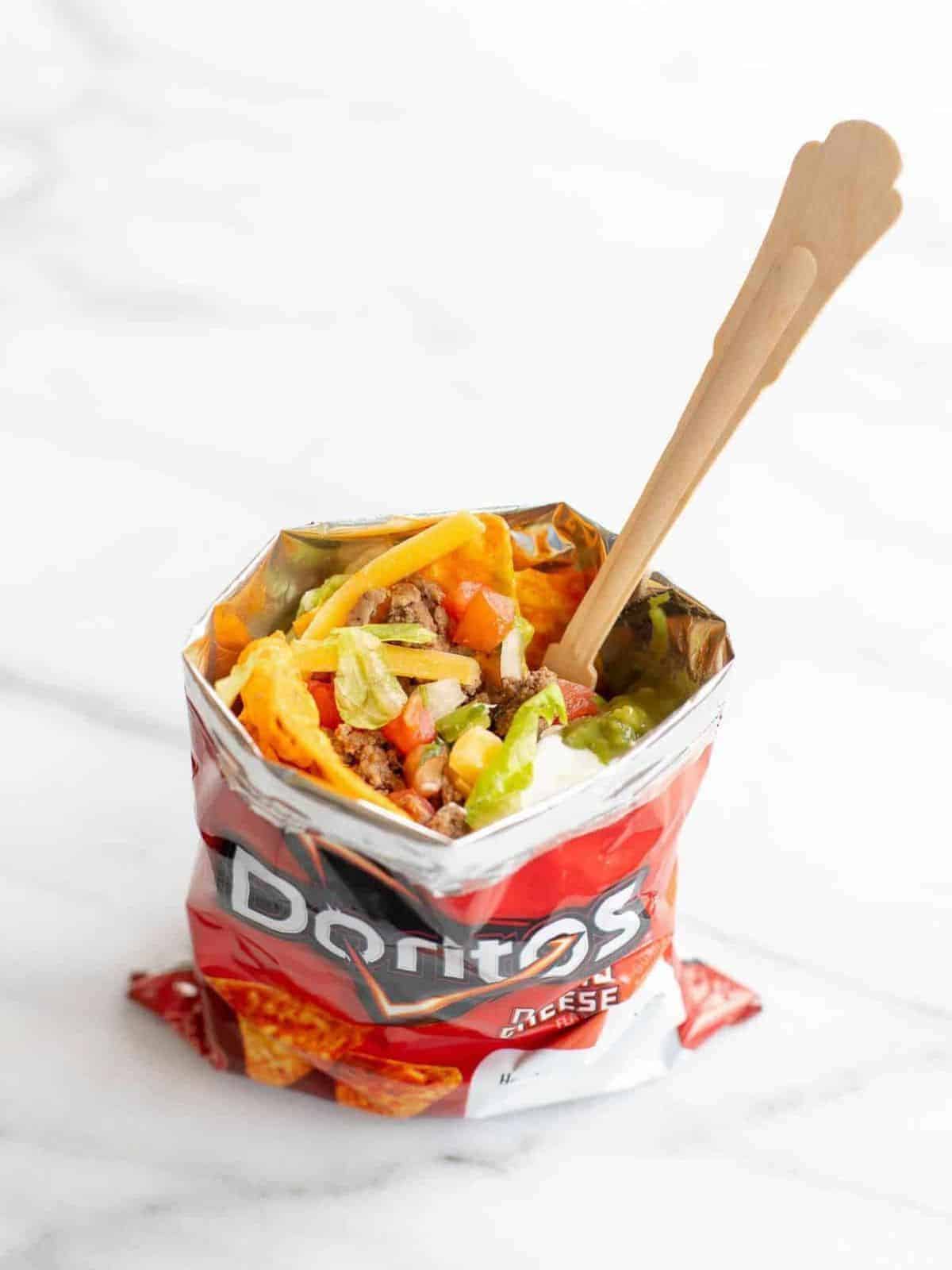 walking taco in dorito bag with fork in it