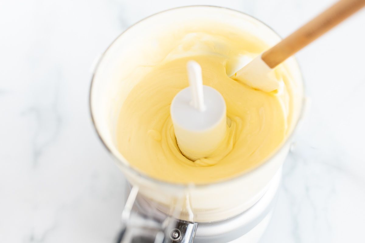 Homemade mayonnaise in a small food processor.