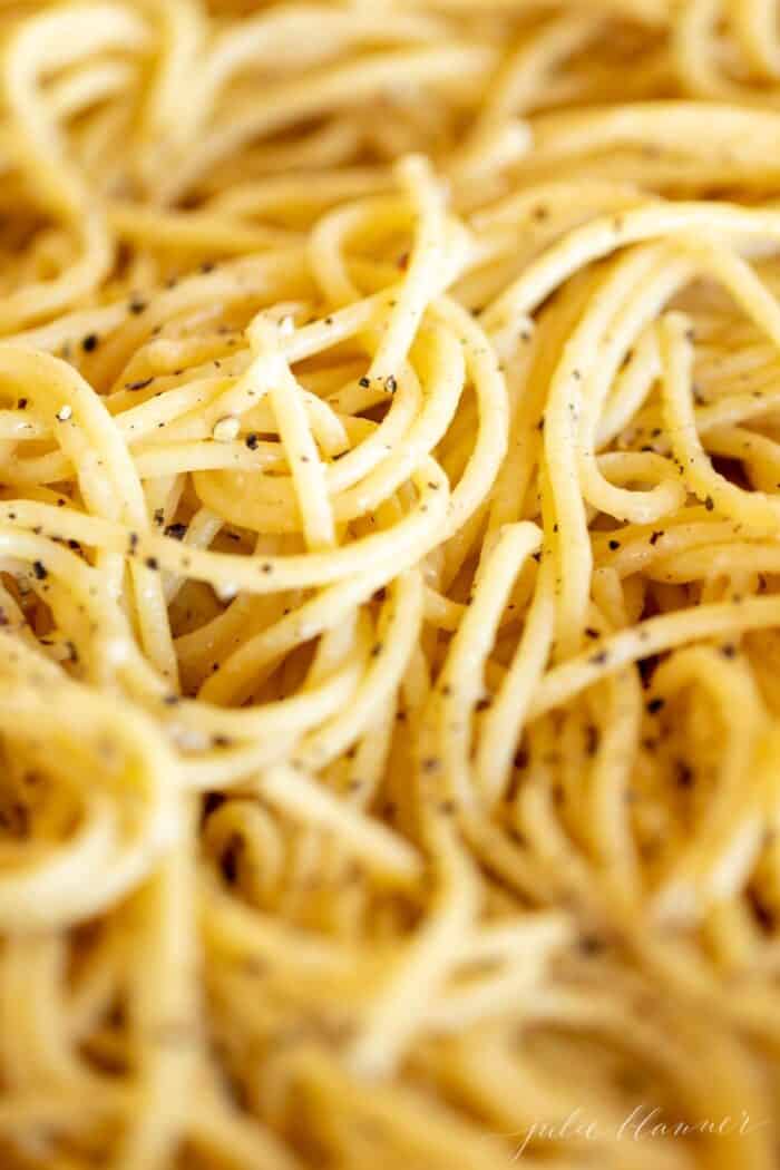 A close up of cacio e pepe spaghetti.