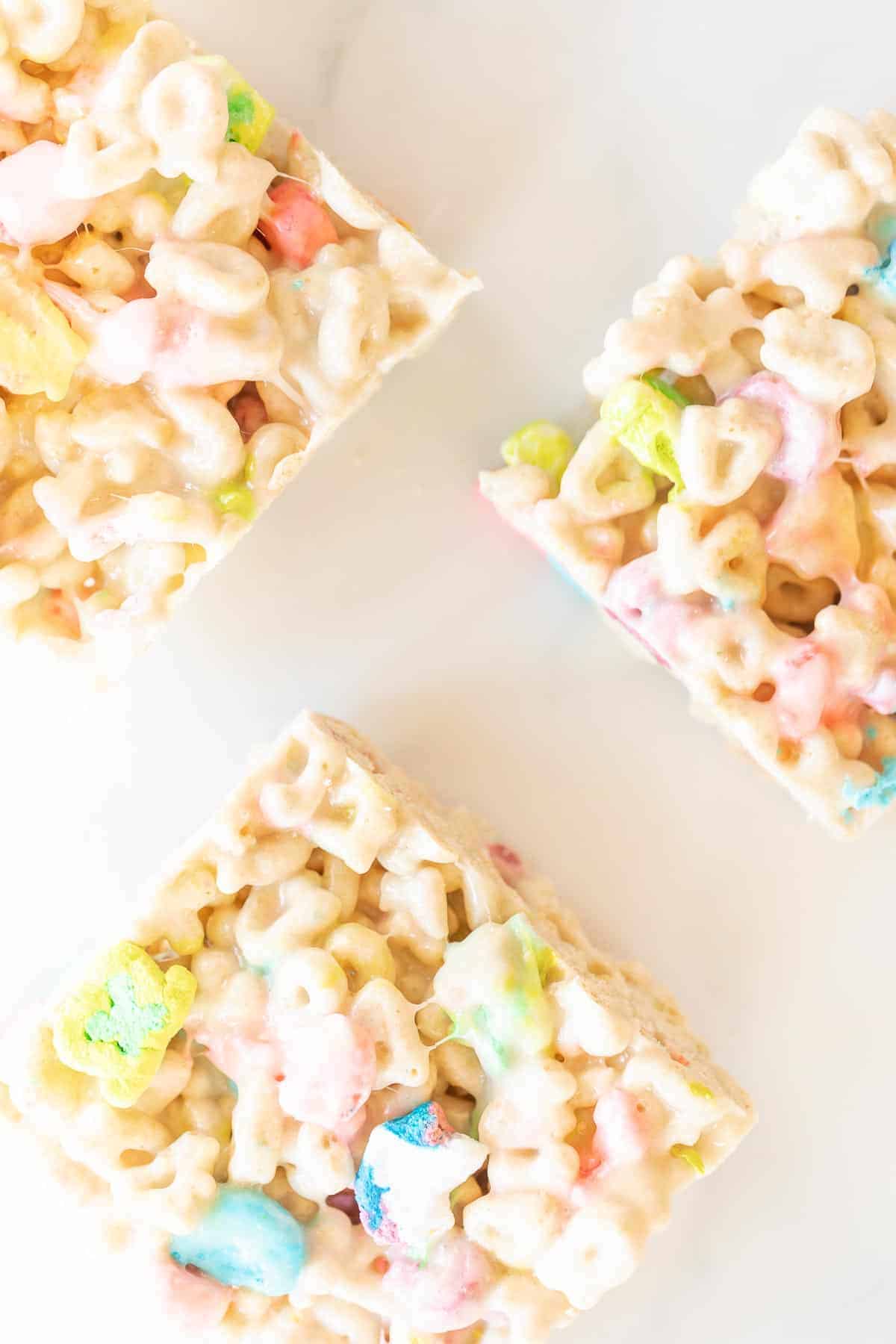3 lucky charms treats on white surface
