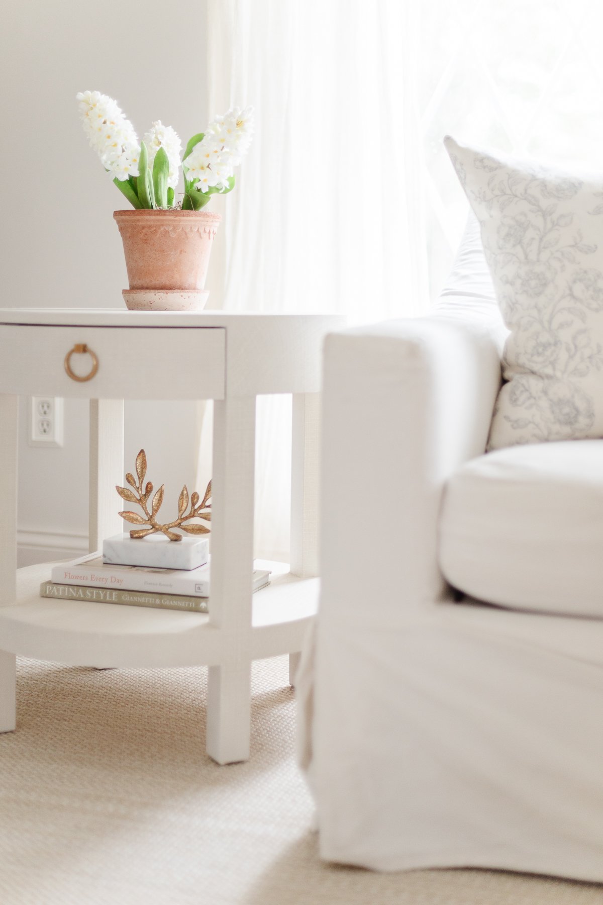 end table white sofa and sisal rug