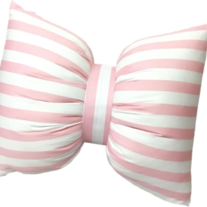 A pink and white striped pillow with a bow on it, perfect for a tween girl bedroom.