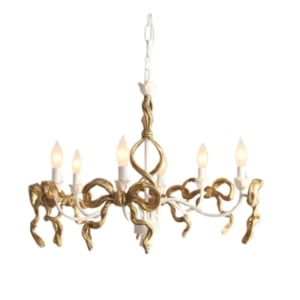 A gold chandelier with six candles would be a perfect addition to a tween bedroom.