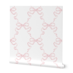 This coquette wallpaper features pink bows, perfect for tween bedroom ideas.