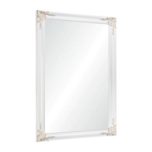 A white mirror with an ornate frame on a tween girl bedroom.