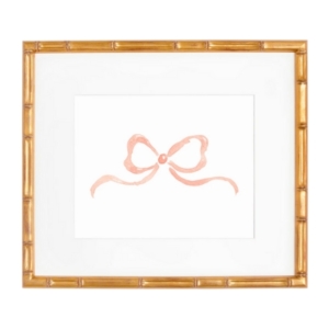 A pink bow encased in a gold frame - perfect for a tween bedroom!