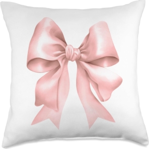 A pink bow pillow on a white background, perfect for a tween girl bedroom.