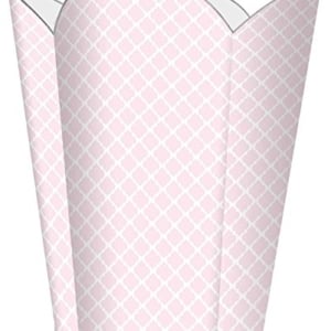A pink and white paper cup on a white background, ideal for tween bedroom ideas.