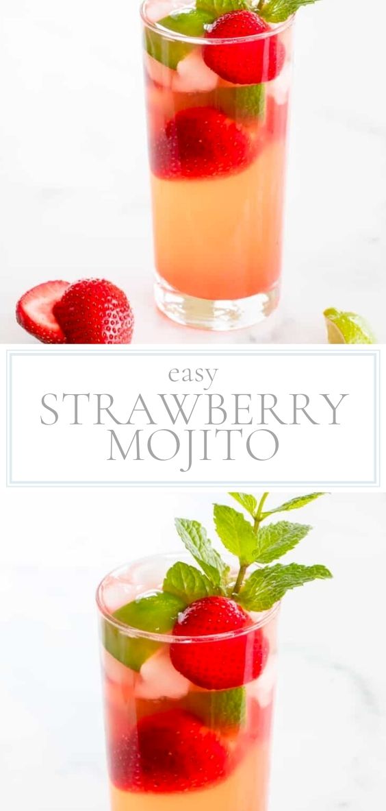 Strawberry Mojito is pictured in a clear glass with fresh strawberries, mint, and limes on a marble counter top.