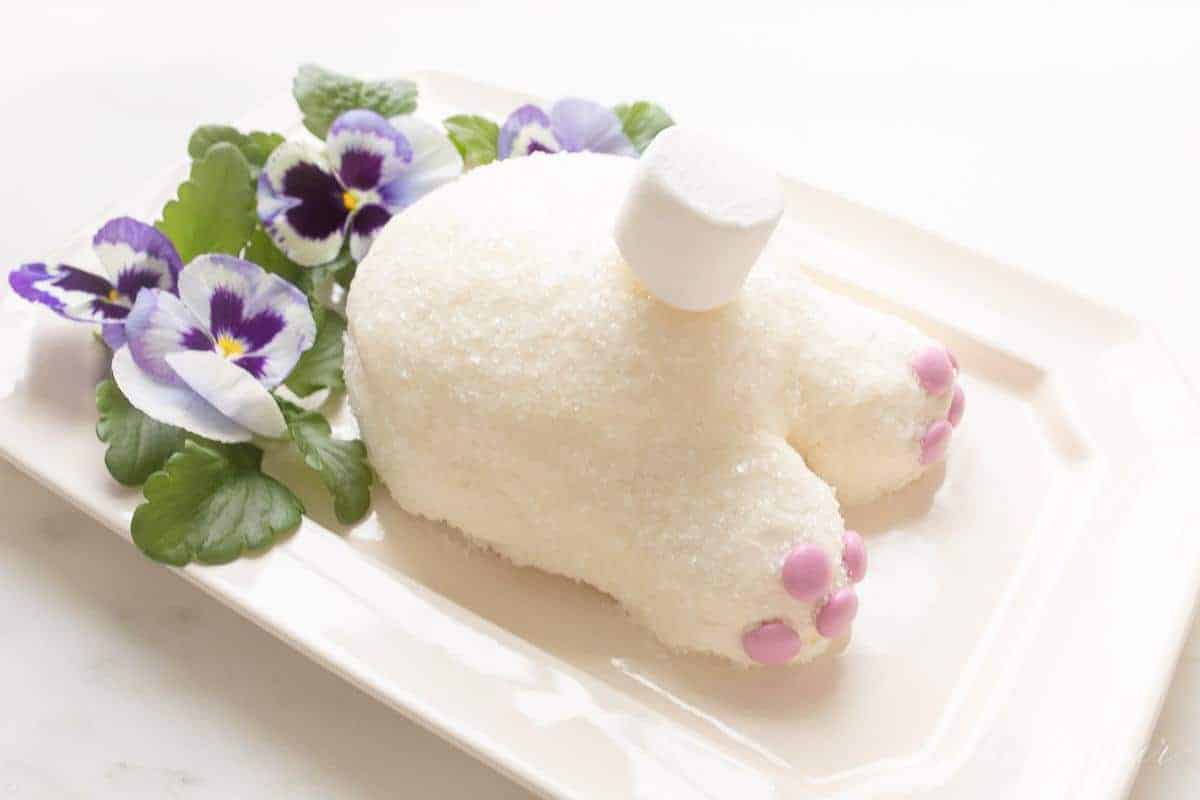 A bunny butt dessert cheeseball on a white platter
