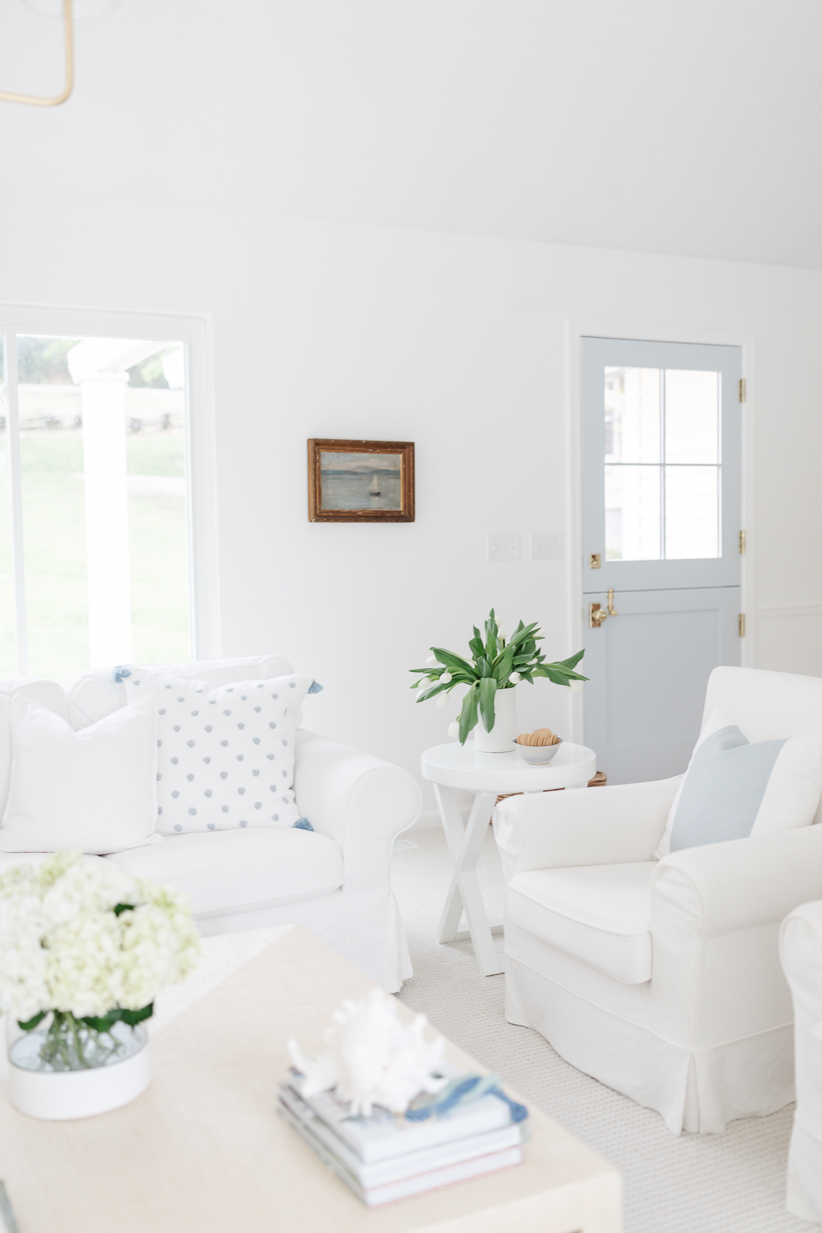 A blue and white modern coastal living room.