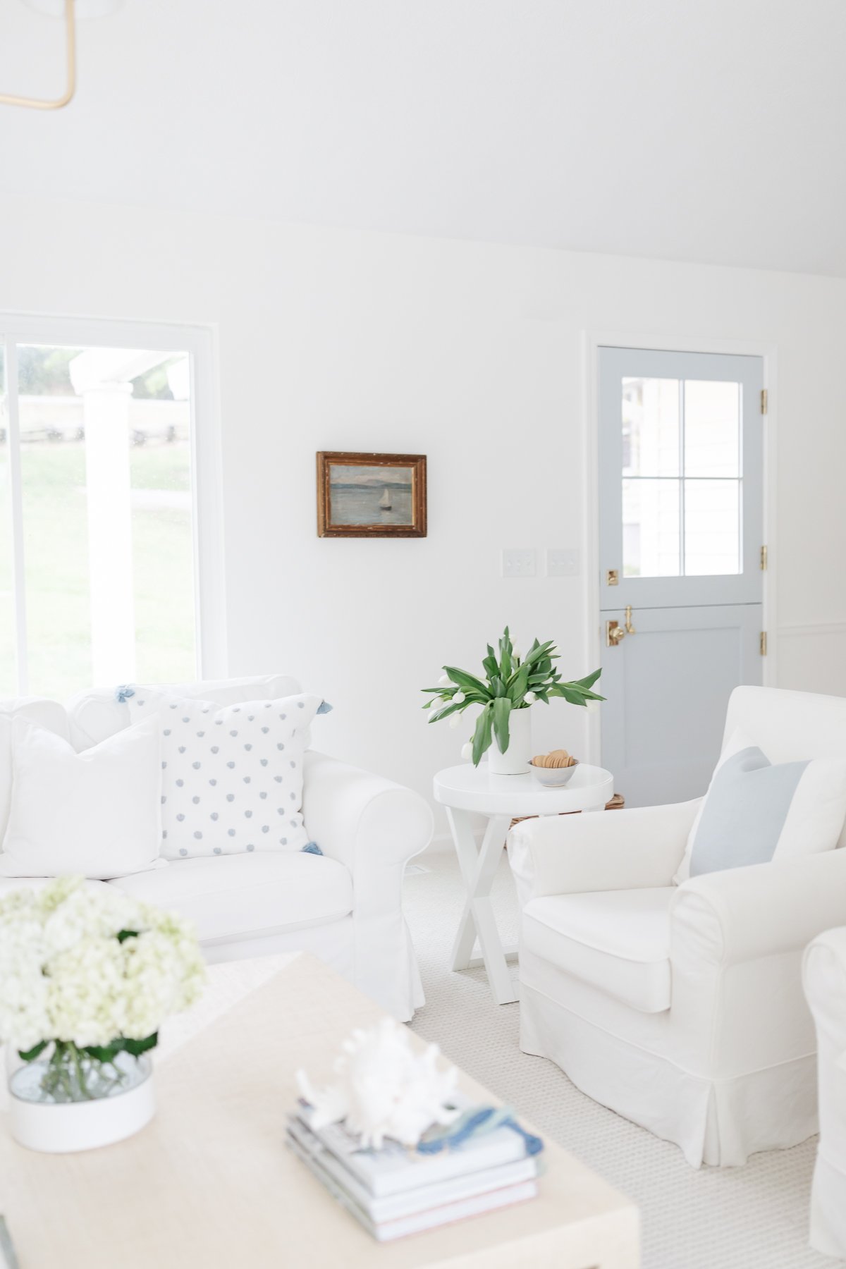 A blue and white modern coastal living room.