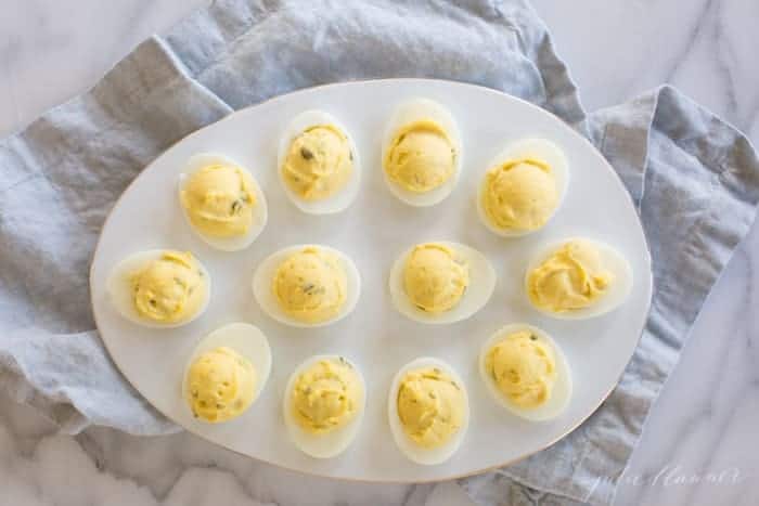 deviled eggs on egg shaped platter