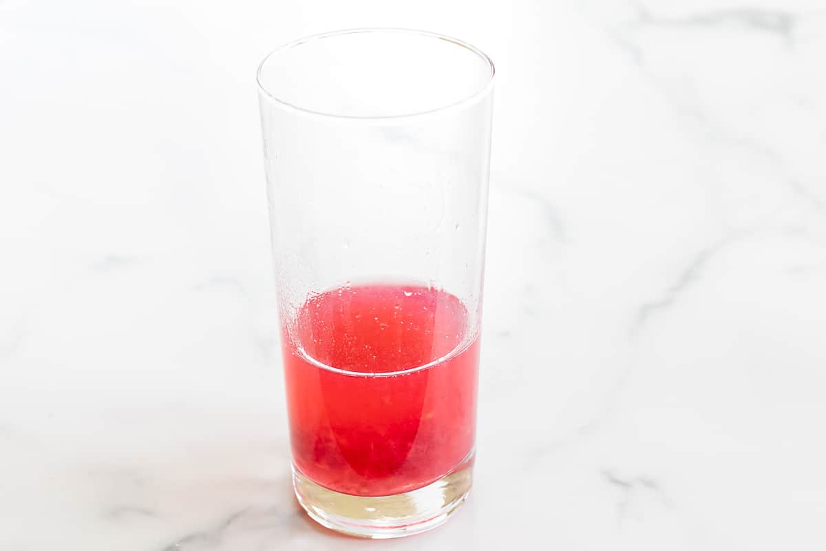 raspberry mixture in highball glass