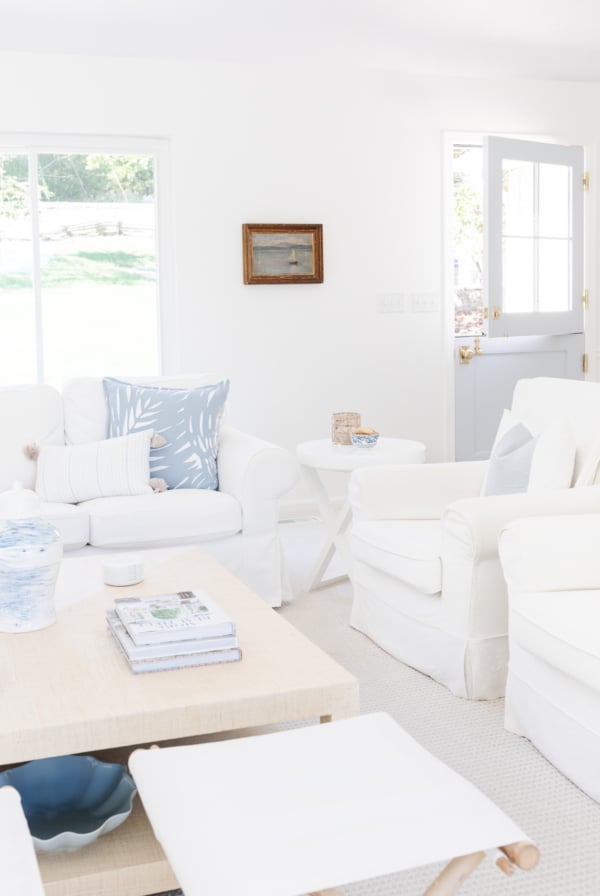 A blue and white modern coastal living room.