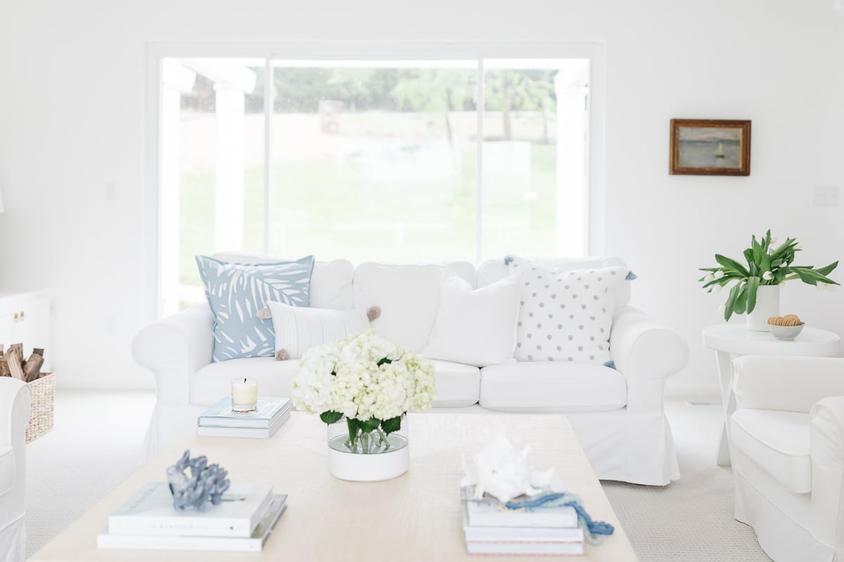 A blue and white modern coastal living room.