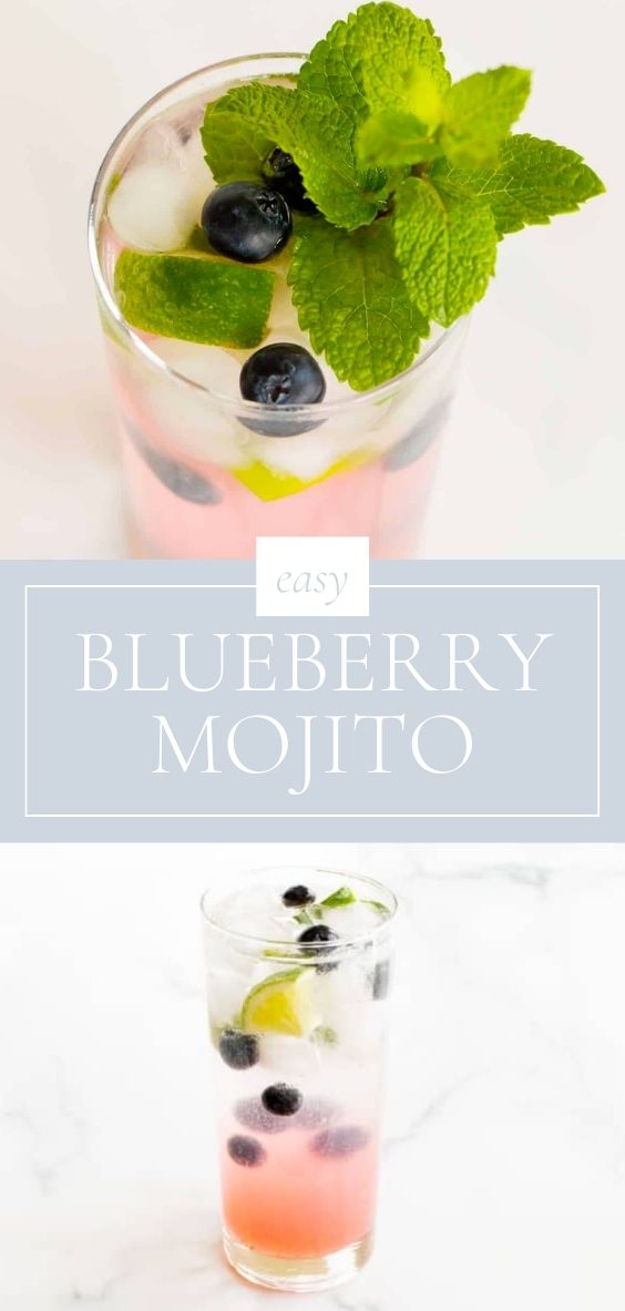 A clear glass with a blueberry mojito.