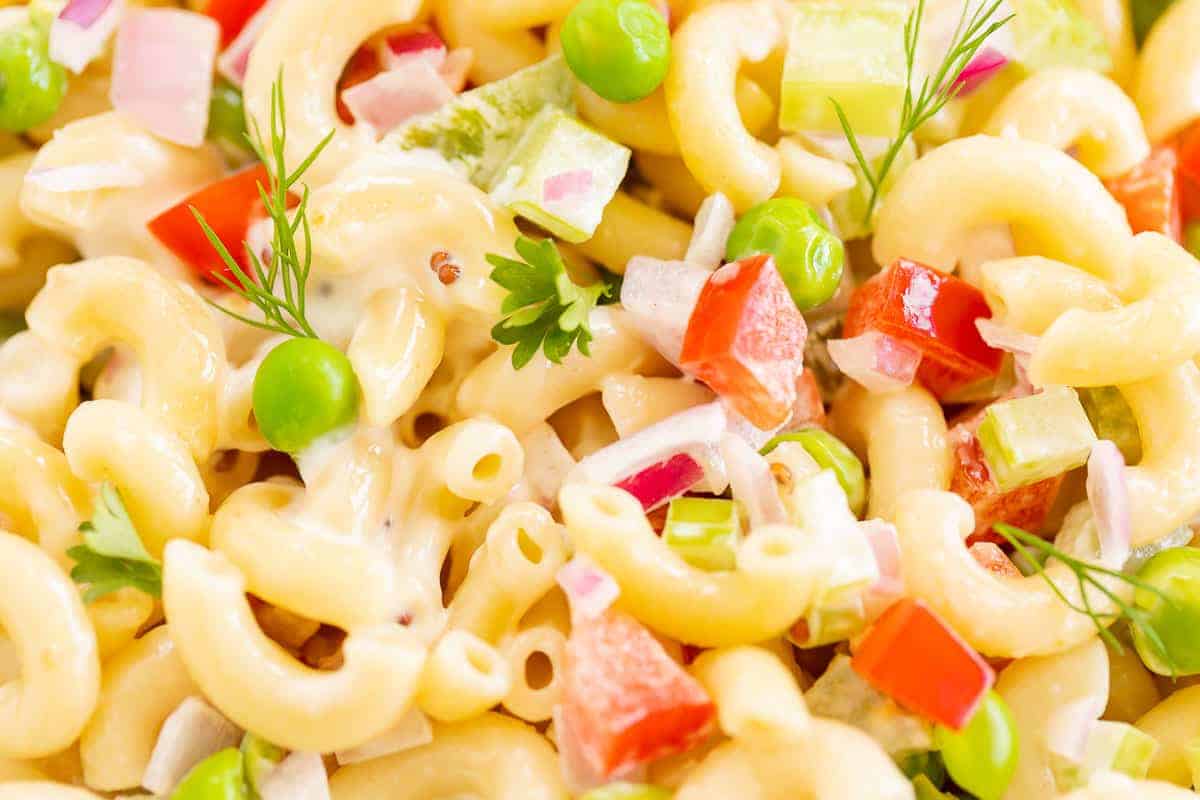closeup of macaroni salad with vegetables