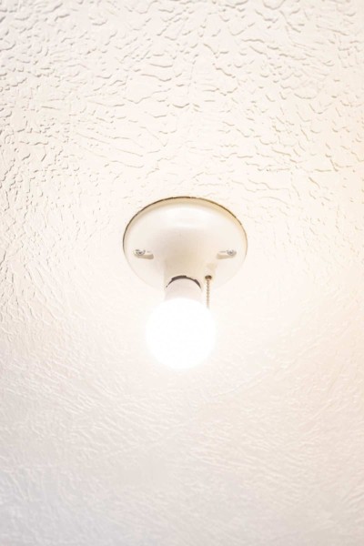 How to Turn a Pull Chain Light Fixture into a Switch | Julie Blanner