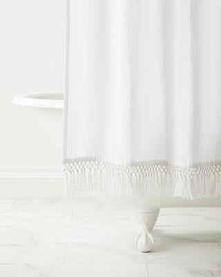 white linen shower curtain with tassels