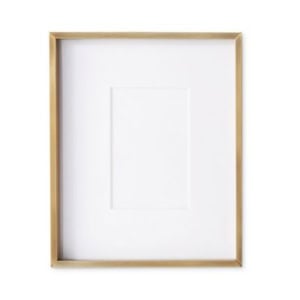 A rectangular gold picture frame with a white mat, perfect for bookshelf decor, displayed against a plain white background.