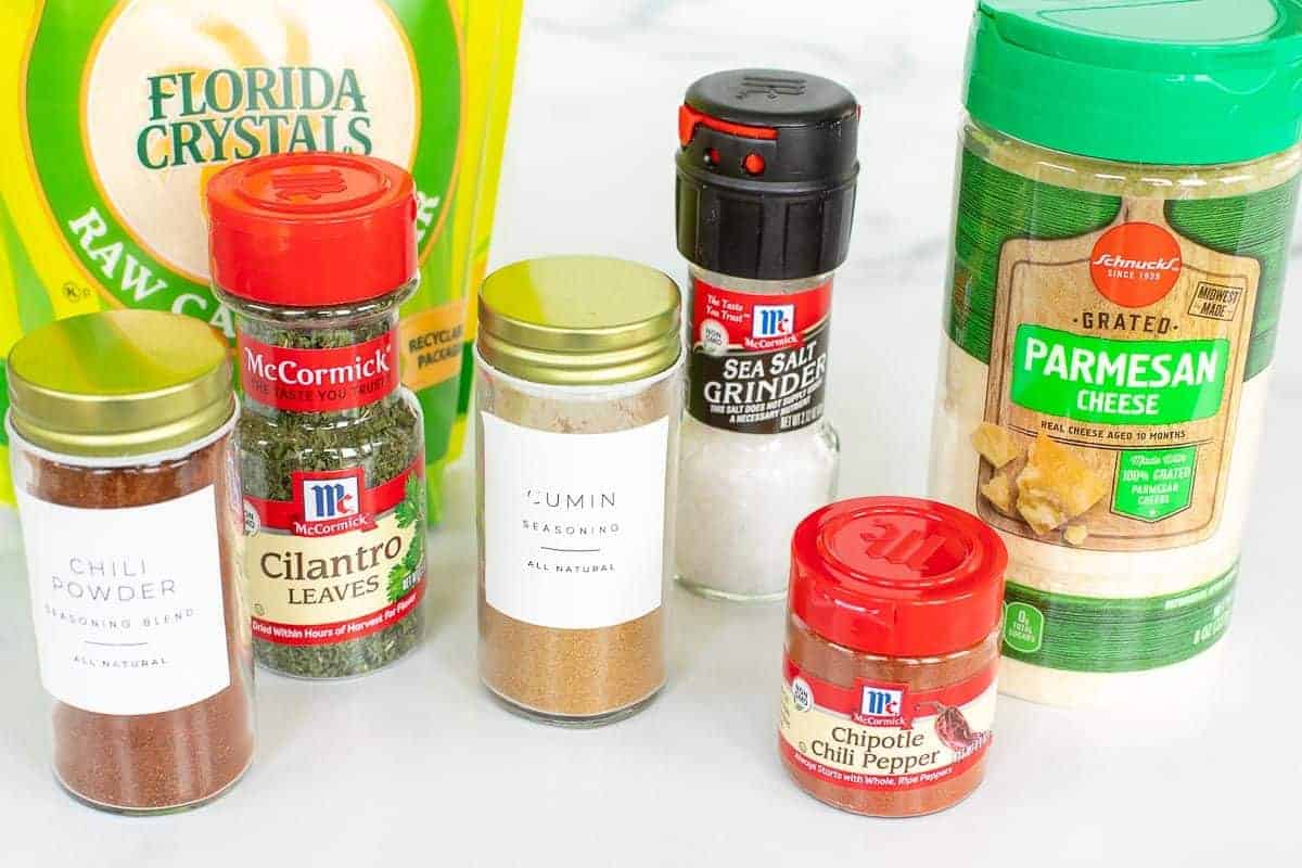 Spices set out to make everything but the elote seasoning blend.
