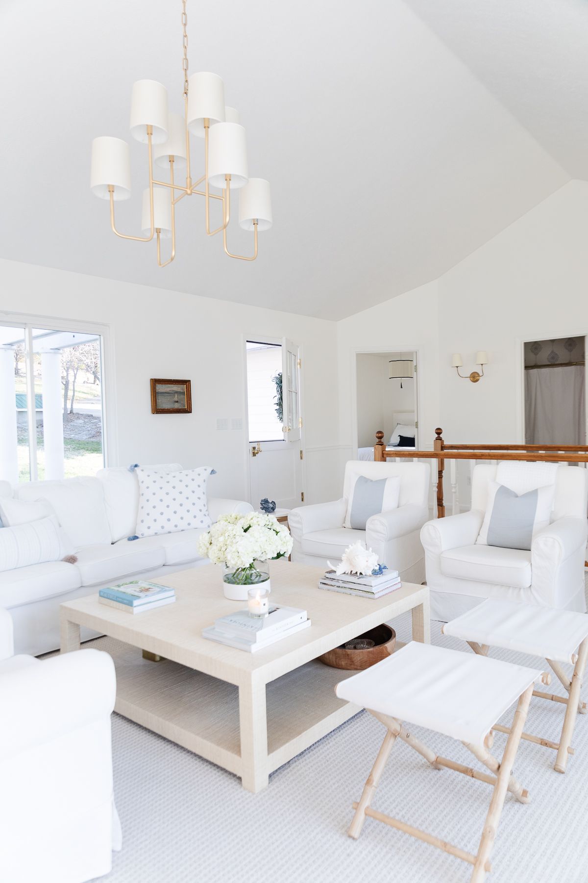 A white living room with Benjamin Moore Simply White on the walls
