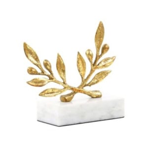Gold decorative branch sculpture with leaves, mounted on a rectangular white marble base—perfect as elegant bookshelf decor.