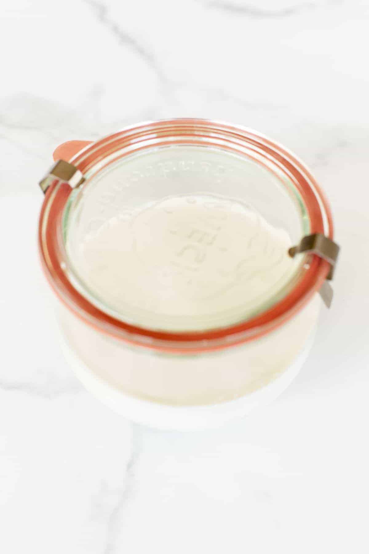 creme fraiche substitute in a clear glass weck jar with lid.