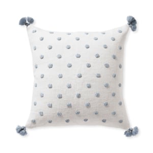 blue dot pillow with tassles