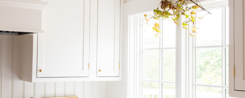kitchen with fall branch hanging over the window