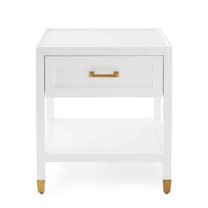 white nightstand with brass feet and pull