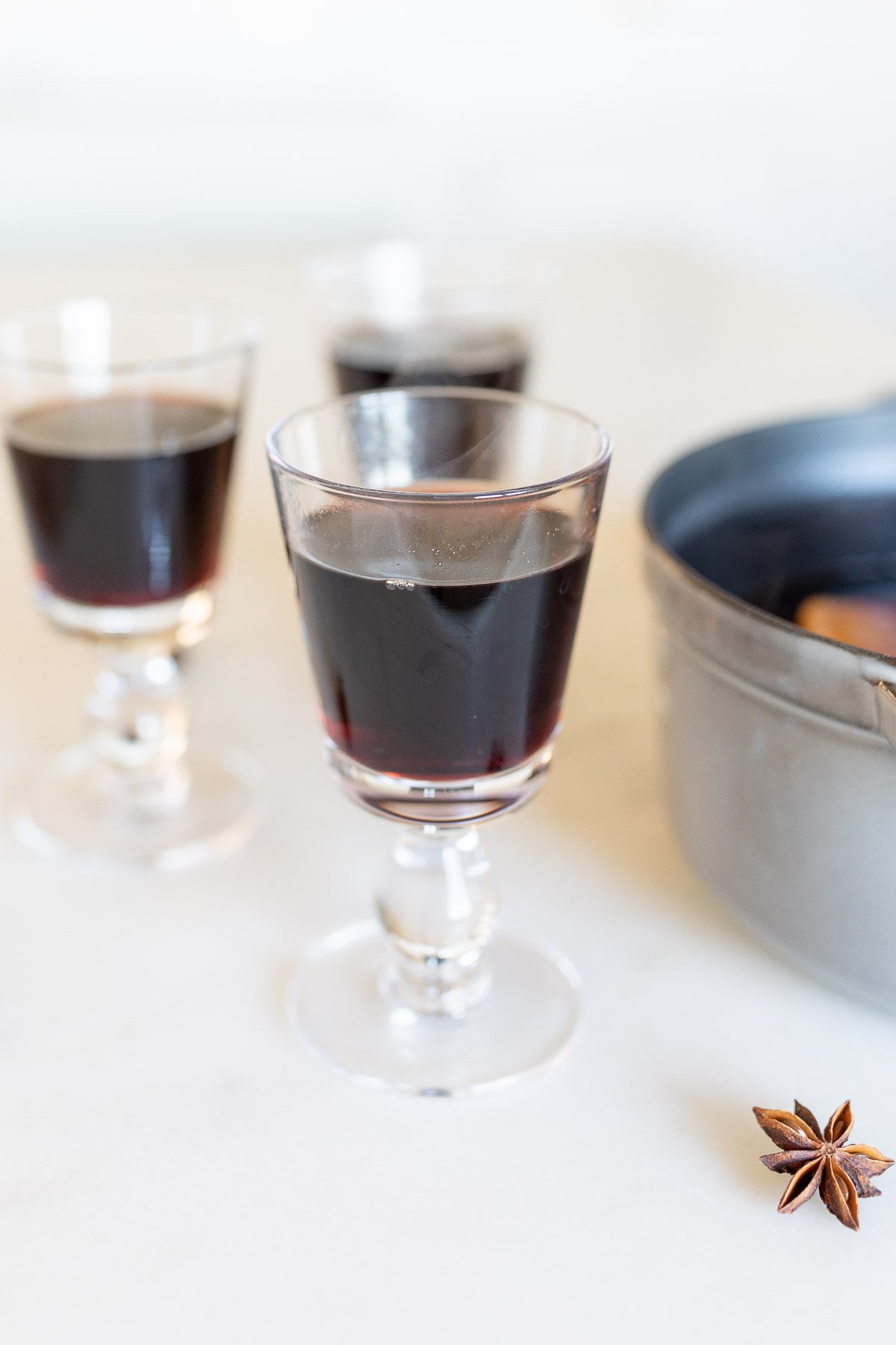 Warm and spiced mulled wine perfect for Thanksgiving, infused with anise and star anise.