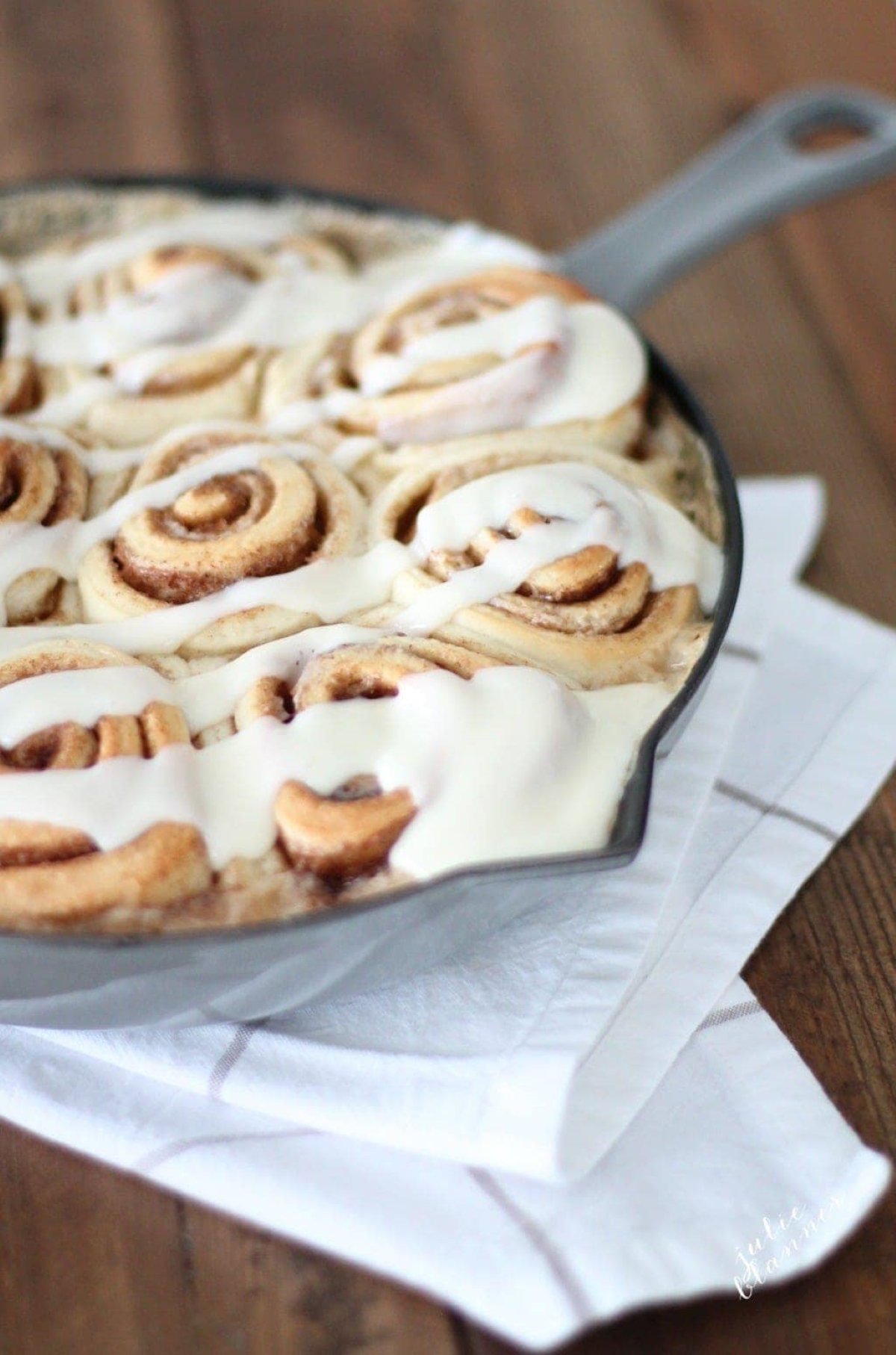 cinnamon rolls in a cast iron skillet