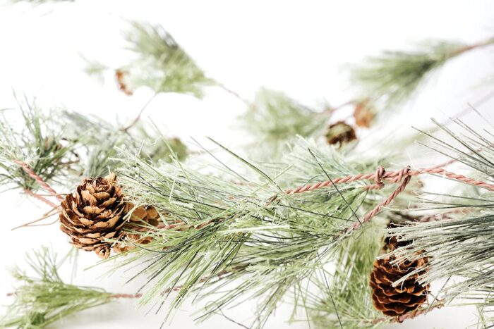 artificial pine garland with pine cones