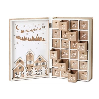 Wooden book-shaped advent calendar with 24 numbered drawers and a decorative winter scene on the inside cover, perfect among our wooden advent calendars.