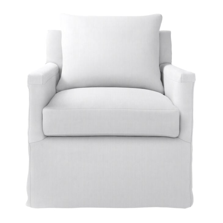 white slipcovered chair