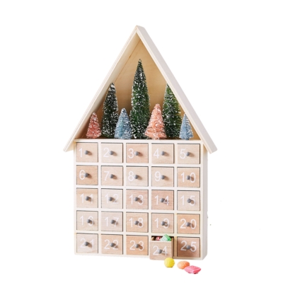 A wooden advent calendar featuring a tree in the middle.