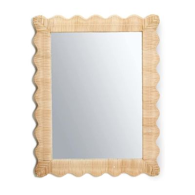 An Amazon home rattan mirror