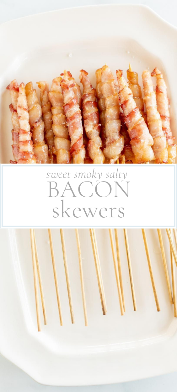 White dish with bacon wrapped around brown wooden skewers