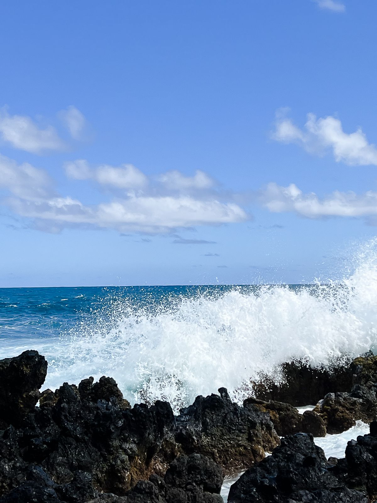 waves crashing on Maui, the best Hawaiian island for families