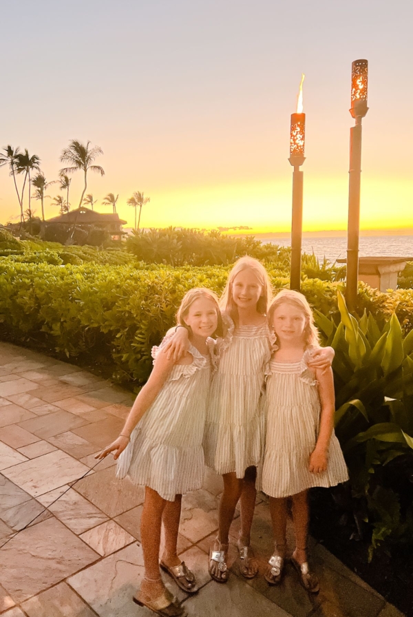 Three little girls with a Maui sunset in the background