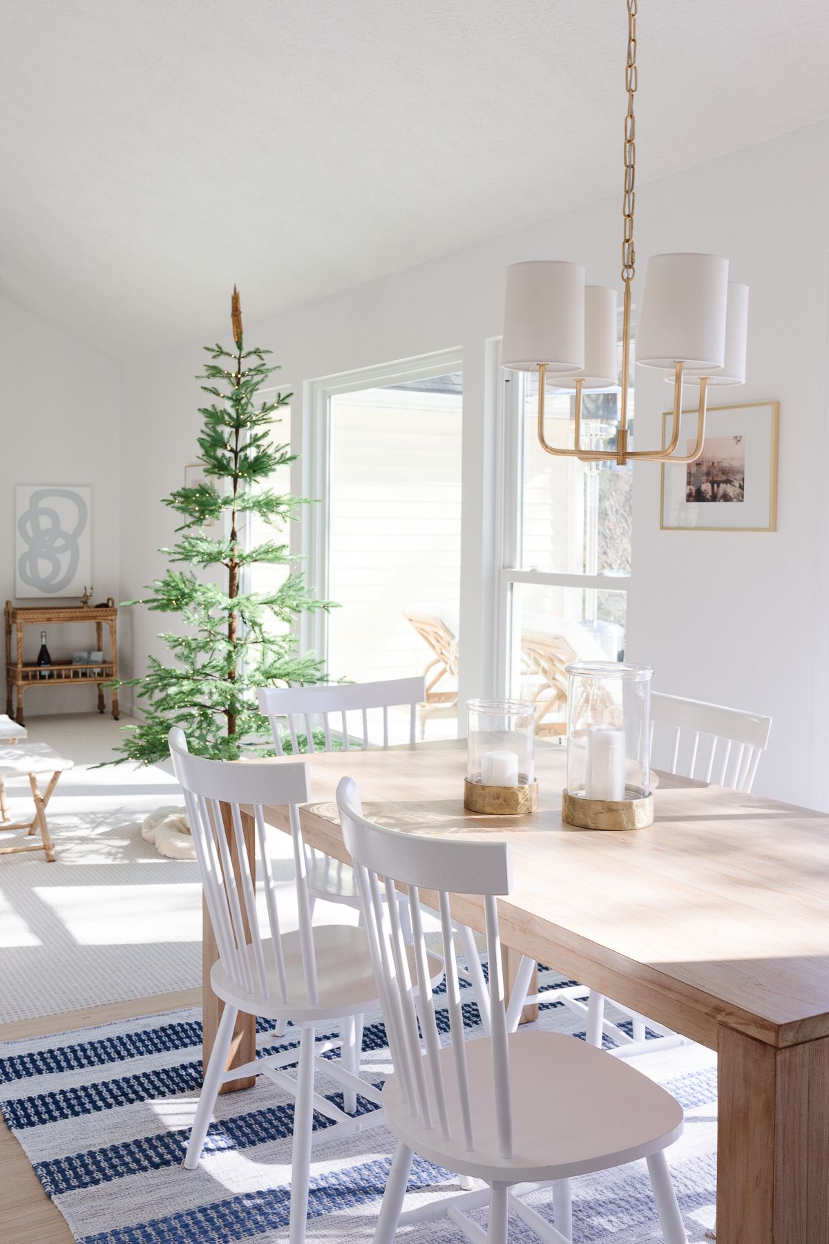 A home painted in Chantilly Lace from Benjamin Moore, Christmas tree in the living room