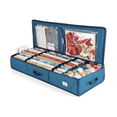 A blue Christmas storage case filled with wrapping paper and ribbons.