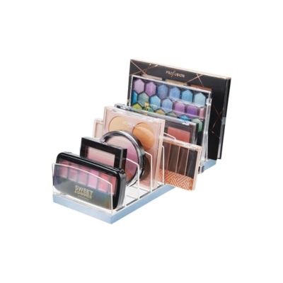 A clear makeup display holder for bathroom organization with a variety of cosmetics.