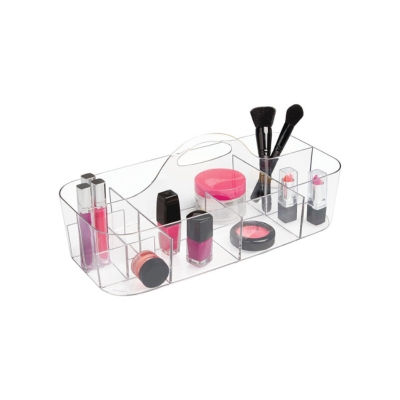 Achieve bathroom organization with a clear makeup organizer featuring lipsticks and brushes.