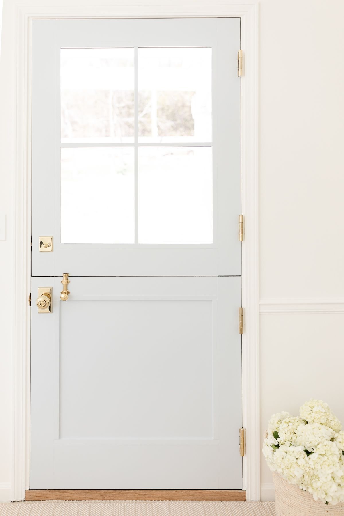 A Dutch door painted silver gray by Benjamin Moore